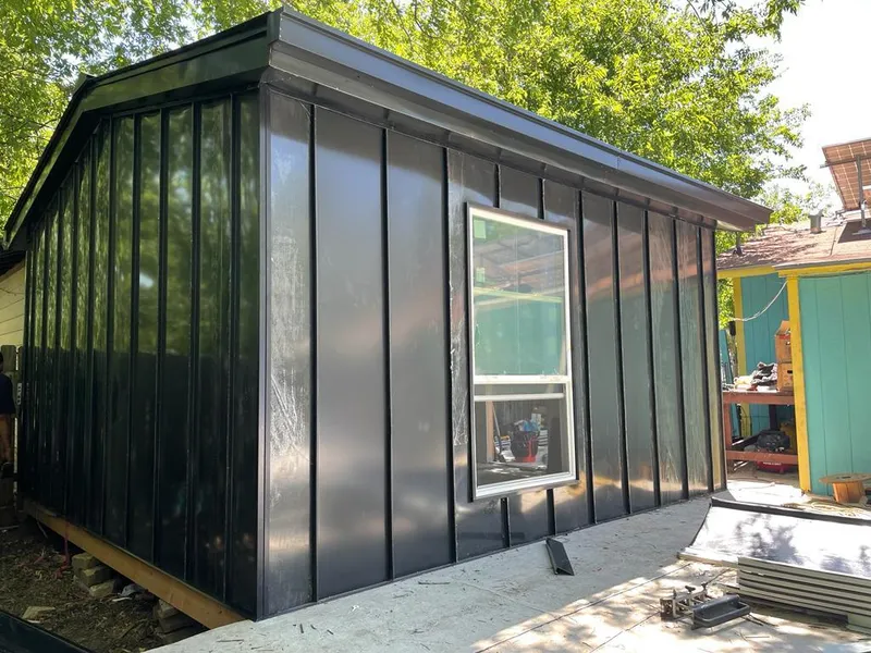 Black standing seam metal wall panels for Metal Roof Installation in South Portland