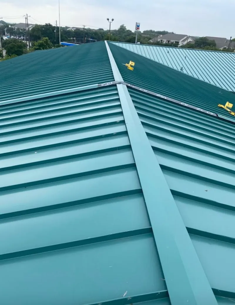 Green commercial metal roof ridge and valley for Metal Roof Repair in South Portland